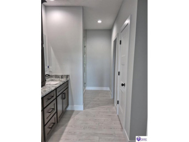 This one is a MUST SEE!  Contemporary Home with an Open Floor on Lincoln Trail Country Club in Kentucky - for sale on GolfHomes.com, golf home, golf lot