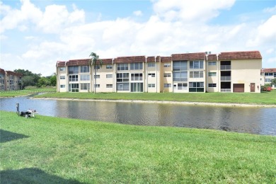 Nice, first floor 1 bedroom apartment with renovated kitchen on Sunrise Lakes Phase III in Florida - for sale on GolfHomes.com, golf home, golf lot