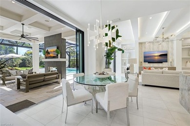 ELEVATED & LUXURIOUS This is a rare opportunity to own a on The Golf Club At Fiddlers Creek in Florida - for sale on GolfHomes.com, golf home, golf lot