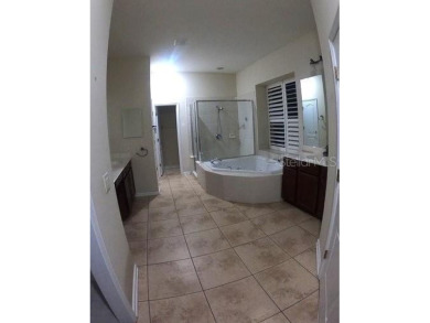 This home isn't the only thing beautiful about this property -- on Grand Haven Golf Club in Florida - for sale on GolfHomes.com, golf home, golf lot