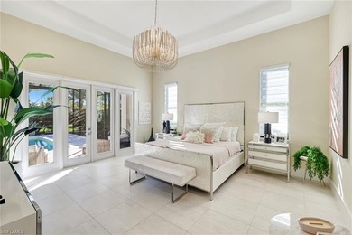 ELEVATED & LUXURIOUS This is a rare opportunity to own a on The Golf Club At Fiddlers Creek in Florida - for sale on GolfHomes.com, golf home, golf lot