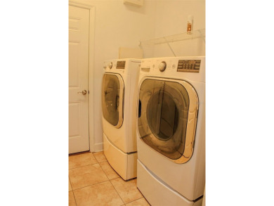 This home isn't the only thing beautiful about this property -- on Grand Haven Golf Club in Florida - for sale on GolfHomes.com, golf home, golf lot