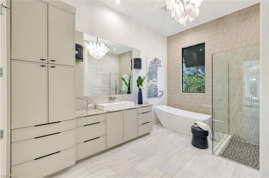 ELEVATED & LUXURIOUS This is a rare opportunity to own a on The Golf Club At Fiddlers Creek in Florida - for sale on GolfHomes.com, golf home, golf lot