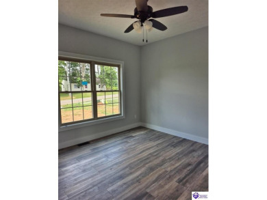 This one is a MUST SEE!  Contemporary Home with an Open Floor on Lincoln Trail Country Club in Kentucky - for sale on GolfHomes.com, golf home, golf lot