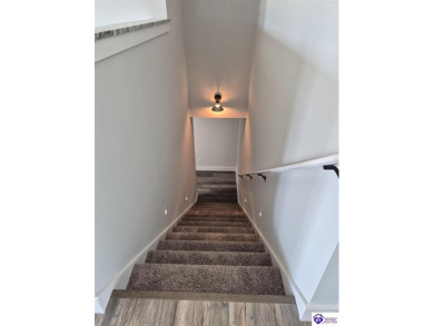 This one is a MUST SEE!  Contemporary Home with an Open Floor on Lincoln Trail Country Club in Kentucky - for sale on GolfHomes.com, golf home, golf lot
