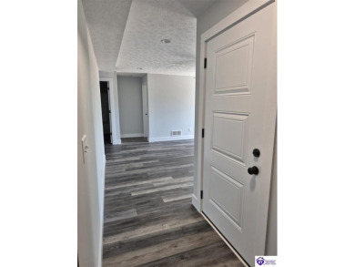 This one is a MUST SEE!  Contemporary Home with an Open Floor on Lincoln Trail Country Club in Kentucky - for sale on GolfHomes.com, golf home, golf lot