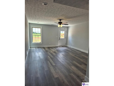 This one is a MUST SEE!  Contemporary Home with an Open Floor on Lincoln Trail Country Club in Kentucky - for sale on GolfHomes.com, golf home, golf lot