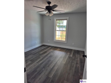 This one is a MUST SEE!  Contemporary Home with an Open Floor on Lincoln Trail Country Club in Kentucky - for sale on GolfHomes.com, golf home, golf lot