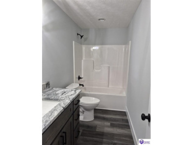 This one is a MUST SEE!  Contemporary Home with an Open Floor on Lincoln Trail Country Club in Kentucky - for sale on GolfHomes.com, golf home, golf lot
