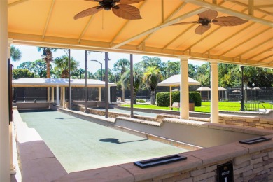 This home isn't the only thing beautiful about this property -- on Grand Haven Golf Club in Florida - for sale on GolfHomes.com, golf home, golf lot