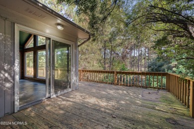 Welcome to this stunning brick home overlooking the 11th fairway on Whispering Pines Golf Course in North Carolina - for sale on GolfHomes.com, golf home, golf lot