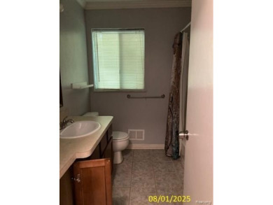 Make it your own in this two story home with 4 bedrooms and 2 on Rush Lake Hills Golf Club in Michigan - for sale on GolfHomes.com, golf home, golf lot