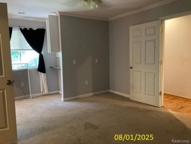 Make it your own in this two story home with 4 bedrooms and 2 on Rush Lake Hills Golf Club in Michigan - for sale on GolfHomes.com, golf home, golf lot