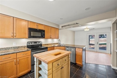 Beautifully updated and filled with natural light, this 2 bed, 2 on Bermuda Run Country Club in North Carolina - for sale on GolfHomes.com, golf home, golf lot