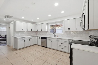 Beautifully remodeled two-story home in a sought-after Temple on Temple Terrace Golf and Country Club in Florida - for sale on GolfHomes.com, golf home, golf lot