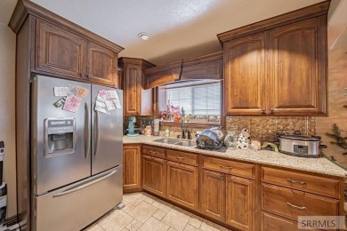 This updated home is just minutes from downtown Idaho Falls on Pinecrest Golf Club in Idaho - for sale on GolfHomes.com, golf home, golf lot