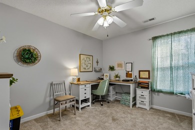 This beautifully maintained 3-bedroom, 2-bath one-story home on Palmetto Greens Golf and Country Club in South Carolina - for sale on GolfHomes.com, golf home, golf lot