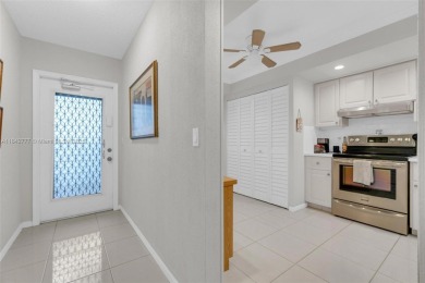 Must See Corner Unit with amazing views 2 Bed/ 2 Bath Condo with on Marina Lakes Golf Course in Florida - for sale on GolfHomes.com, golf home, golf lot