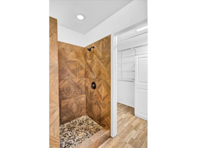 Welcome to your serene retreat in the gated community of on Hide-A-Way Lake Golf Course in Texas - for sale on GolfHomes.com, golf home, golf lot