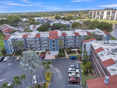 Must See Corner Unit with amazing views 2 Bed/ 2 Bath Condo with on Marina Lakes Golf Course in Florida - for sale on GolfHomes.com, golf home, golf lot