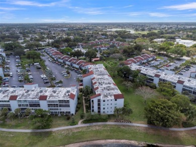 Must See Corner Unit with amazing views 2 Bed/ 2 Bath Condo with on Marina Lakes Golf Course in Florida - for sale on GolfHomes.com, golf home, golf lot