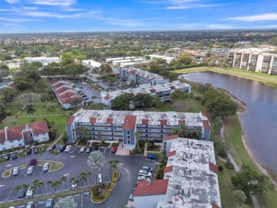Must See Corner Unit with amazing views 2 Bed/ 2 Bath Condo with on Marina Lakes Golf Course in Florida - for sale on GolfHomes.com, golf home, golf lot