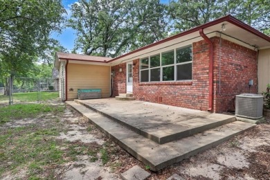 Welcome to your serene retreat in the gated community of on Hide-A-Way Lake Golf Course in Texas - for sale on GolfHomes.com, golf home, golf lot