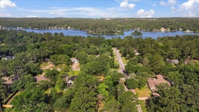 Welcome to your serene retreat in the gated community of on Hide-A-Way Lake Golf Course in Texas - for sale on GolfHomes.com, golf home, golf lot
