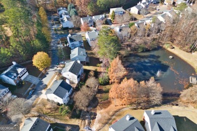 Brand New Roof 2025! Welcome to your dream home, where comfort on Collins Hill Golf Club in Georgia - for sale on GolfHomes.com, golf home, golf lot