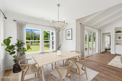 Discover the Skiff, a beautiful new Logan Home, located in on Sea Trail Golf Resort in North Carolina - for sale on GolfHomes.com, golf home, golf lot