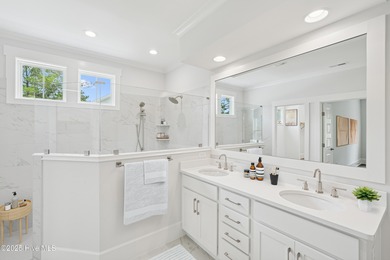 Discover the Skiff, a beautiful new Logan Home, located in on Sea Trail Golf Resort in North Carolina - for sale on GolfHomes.com, golf home, golf lot