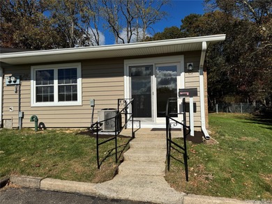 This completely renovated extraordinary Greenbriar model end on Leisure Village Golf Course in New York - for sale on GolfHomes.com, golf home, golf lot