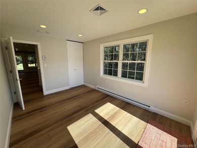 This completely renovated extraordinary Greenbriar model end on Leisure Village Golf Course in New York - for sale on GolfHomes.com, golf home, golf lot