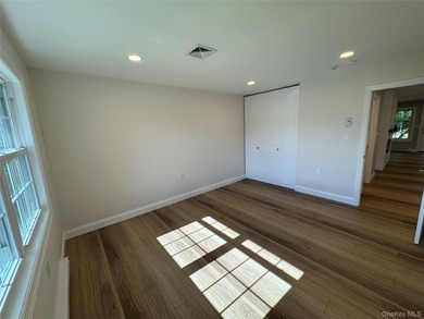 This completely renovated extraordinary Greenbriar model end on Leisure Village Golf Course in New York - for sale on GolfHomes.com, golf home, golf lot