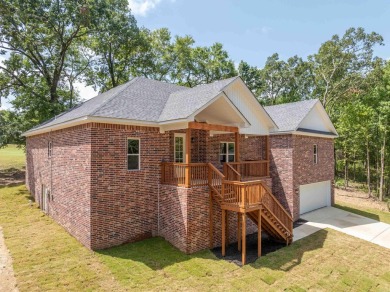 Welcome to this beautiful new construction home in the gated on Diamondhead Golf and Country Club in Arkansas - for sale on GolfHomes.com, golf home, golf lot