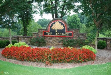 Build your dream home with a basement on this 1.55 acre lot on The Orchard Golf and Country Club in Georgia - for sale on GolfHomes.com, golf home, golf lot