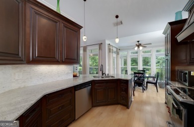 Beautifully kept and upgraded! Enter the soaring two story foyer on Eagles Landing Country Club in Georgia - for sale on GolfHomes.com, golf home, golf lot