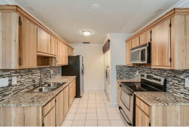 Discover this charming 2-bedroom, 2-bathroom villa in the on Cypress Lakes Golf Course - West Palm Beach in Florida - for sale on GolfHomes.com, golf home, golf lot