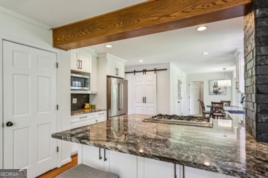 Tucked away on a large (over 1/2 acre lot) in the heart of on Indian Hills Country Club in Georgia - for sale on GolfHomes.com, golf home, golf lot