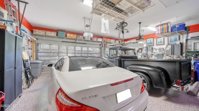 Welcome home to this meticulously maintained 5-bed, 3-bath pool on The Palencia Club in Florida - for sale on GolfHomes.com, golf home, golf lot