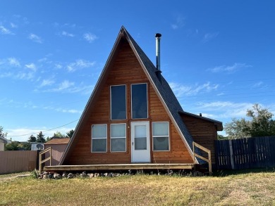 NEW ROOF! NEW CEDAR SIDING and a perfect location! Lake Beckwith on Hollydot Golf Course in Colorado - for sale on GolfHomes.com, golf home, golf lot