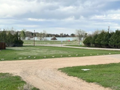 NEW ROOF! NEW CEDAR SIDING and a perfect location! Lake Beckwith on Hollydot Golf Course in Colorado - for sale on GolfHomes.com, golf home, golf lot