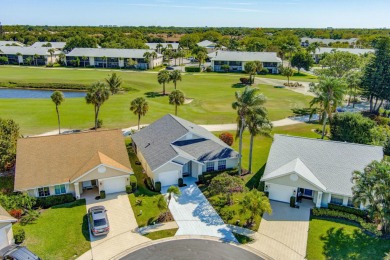 This Newly Updated 3BR/2BA Home Rests in the Highly Desirable on The Golf Club of Jupiter in Florida - for sale on GolfHomes.com, golf home, golf lot