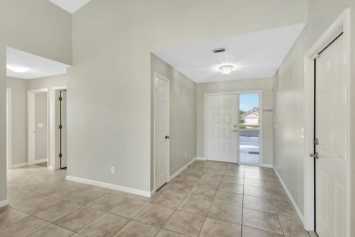 This Newly Updated 3BR/2BA Home Rests in the Highly Desirable on The Golf Club of Jupiter in Florida - for sale on GolfHomes.com, golf home, golf lot
