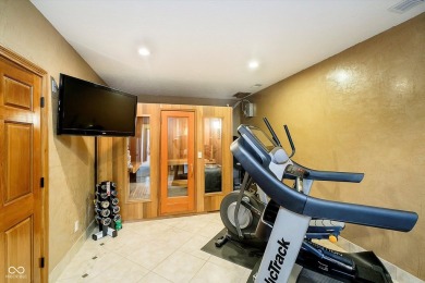 Welcome to an extraordinary 5-bedroom, 5.5-bath masterpiece on Hickory Stick Golf Club in Indiana - for sale on GolfHomes.com, golf home, golf lot
