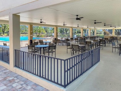 Enjoy Privacy, Space, and a smart layout in this beautifully on Highland Lakes Executive Golf Course in Florida - for sale on GolfHomes.com, golf home, golf lot