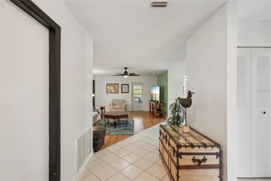 Short Sale. Enjoy carefree Florida living in this beautifully on Falcon Watch Golf Club in Florida - for sale on GolfHomes.com, golf home, golf lot
