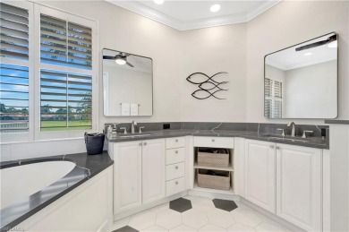 Rarely available first floor end unit with attached, direct on Pelican Marsh Golf Club in Florida - for sale on GolfHomes.com, golf home, golf lot