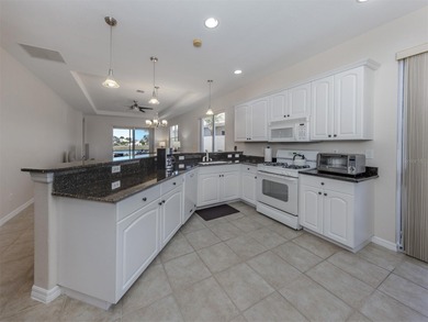 Welcome to this charming WCI-built residence, a beautifully on Venetian Golf and River Club in Florida - for sale on GolfHomes.com, golf home, golf lot