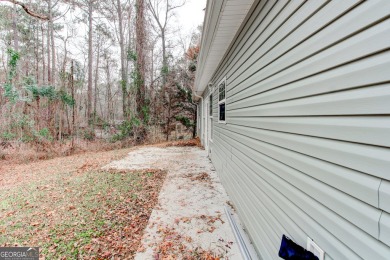 Perfect for first-time buyers! This charming 3-bedroom on Turtle Cove Golf Course in Georgia - for sale on GolfHomes.com, golf home, golf lot